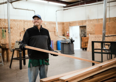 Person working with wooden slats