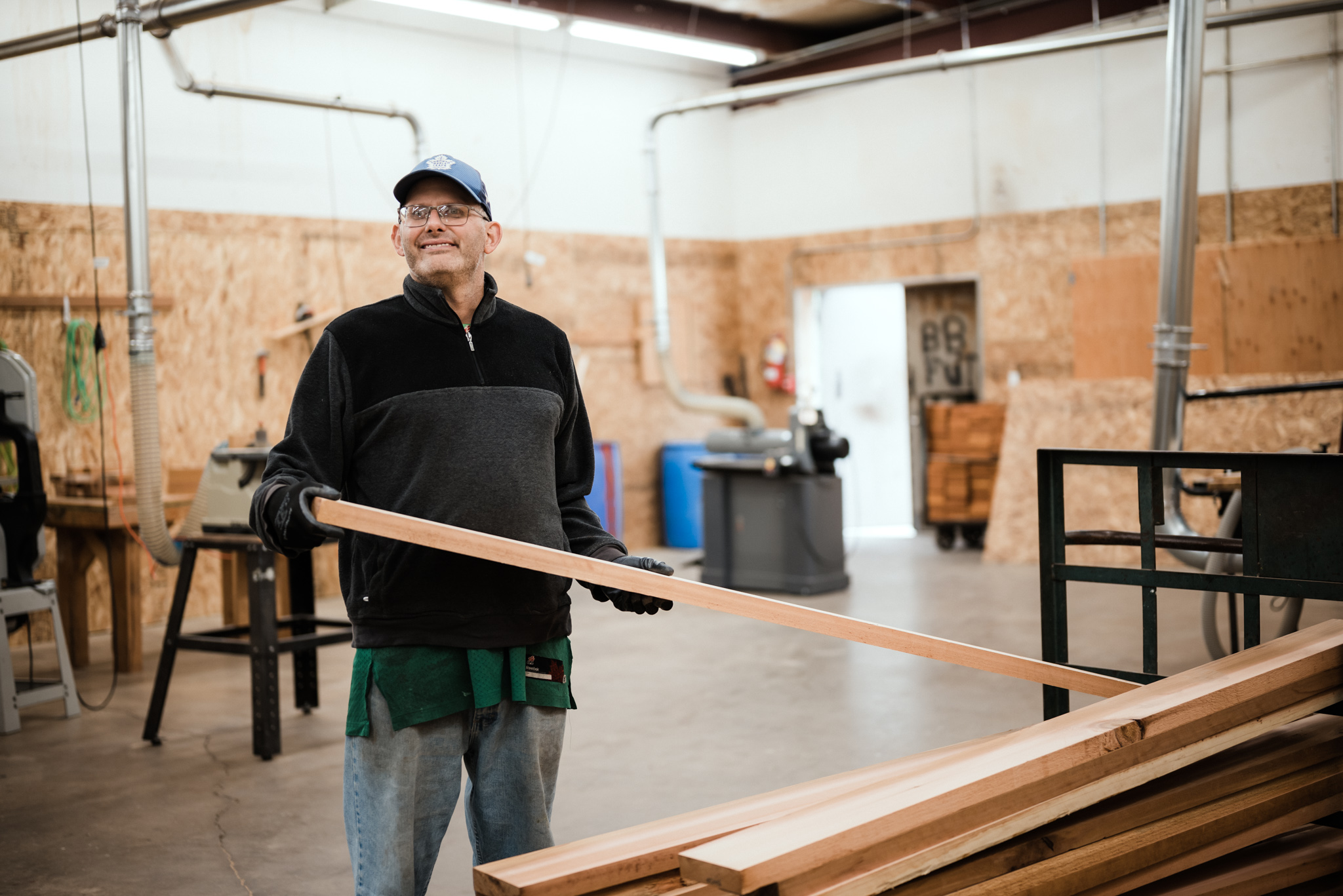 Person working with wooden slats